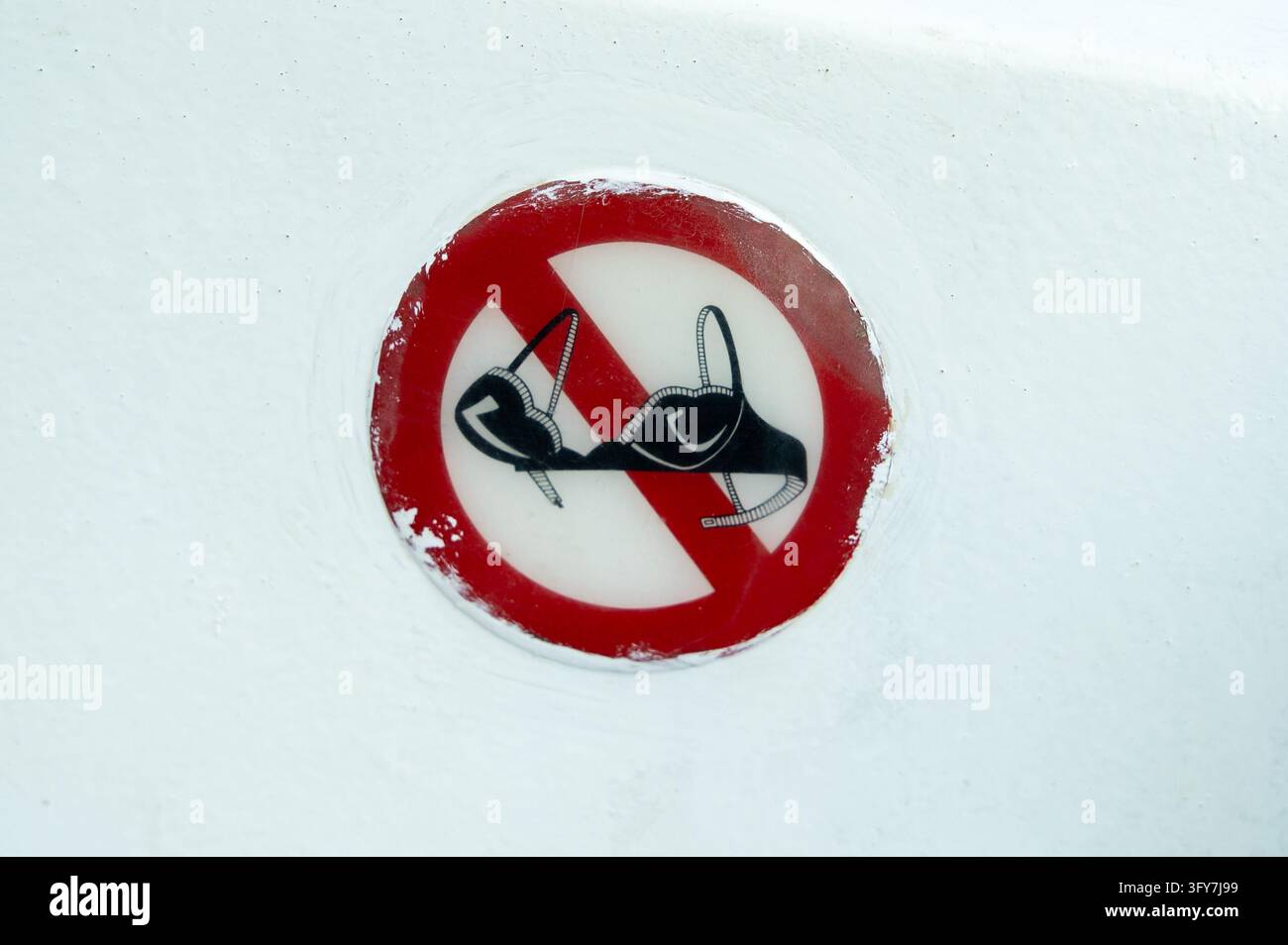 Close-up of red circular prohibition sign showing crossed-out high ...