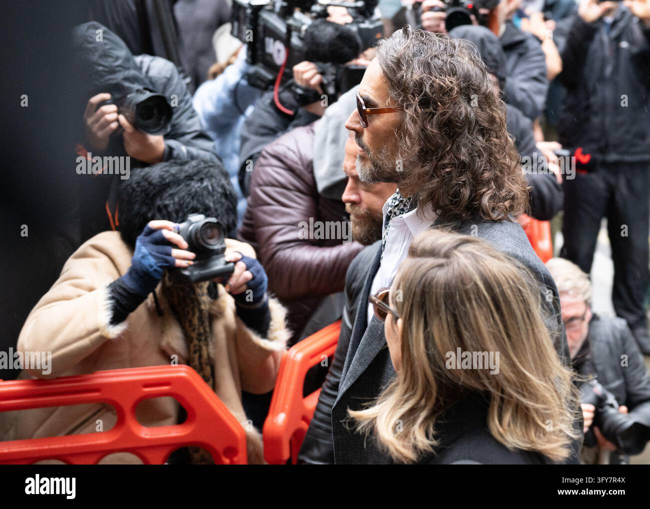 Russell Brand arrives at Southwark Crown Court in London, England. UK ...