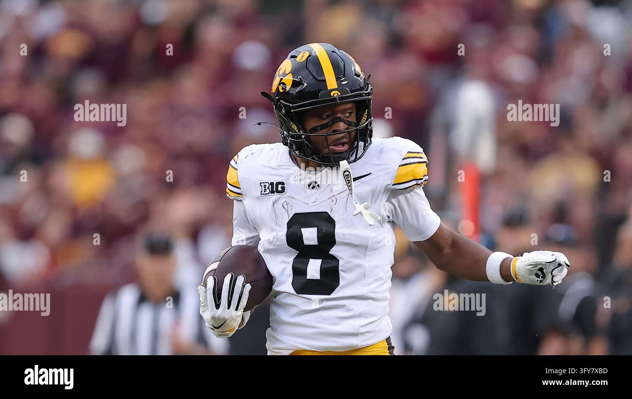 Iowa wide receiver Evan James runs with the ball during the second half ...