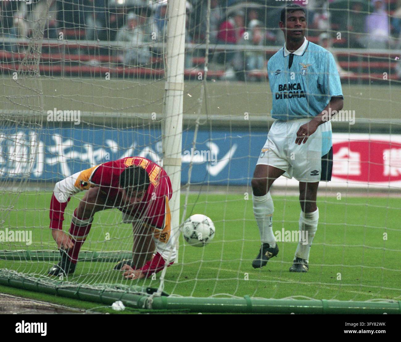 Gary Linker in the net after heading a goal for Nagoya Grampus Eight ...