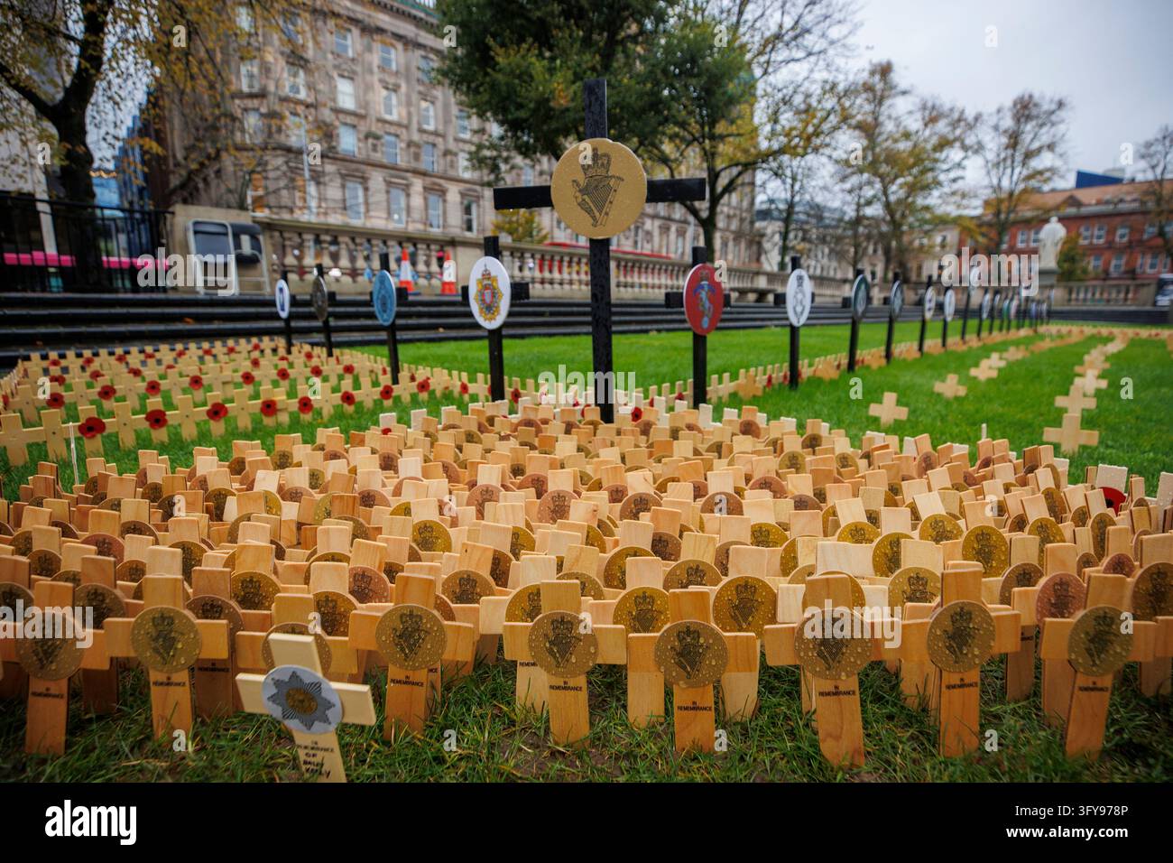 Wooden remembrance crosses bearing the crowned Maid of Erin harp emblem ...