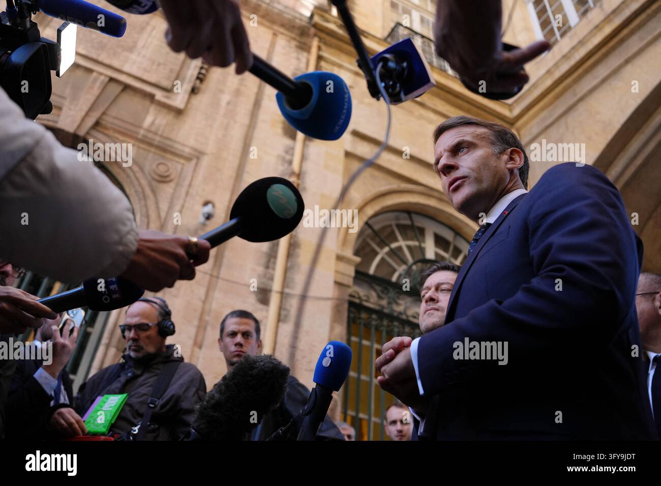 French President Emmanuel Macron addresses the media in Marseille ...