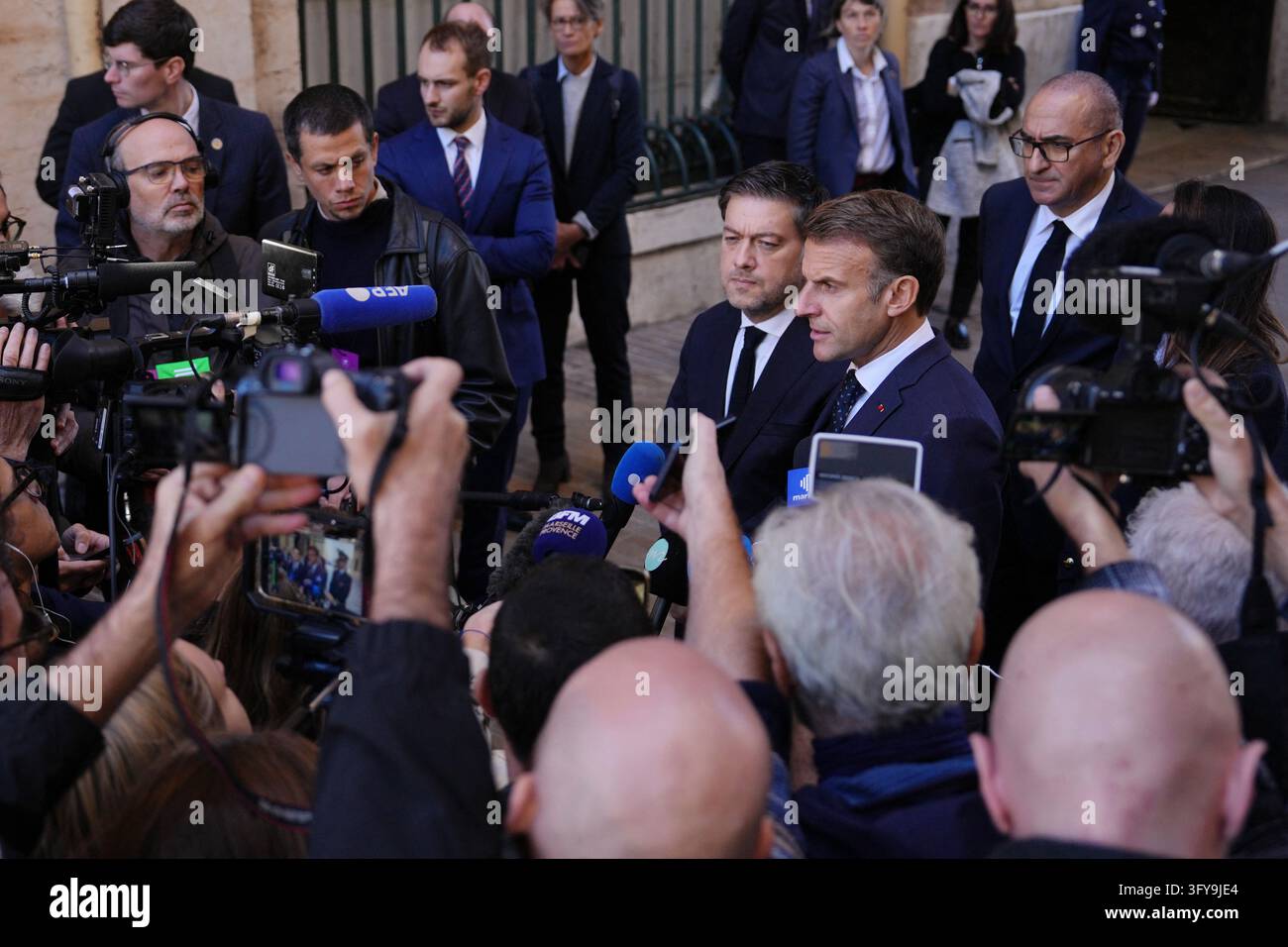 French President Emmanuel Macron and Marseille Mayor Benoit Payan ...