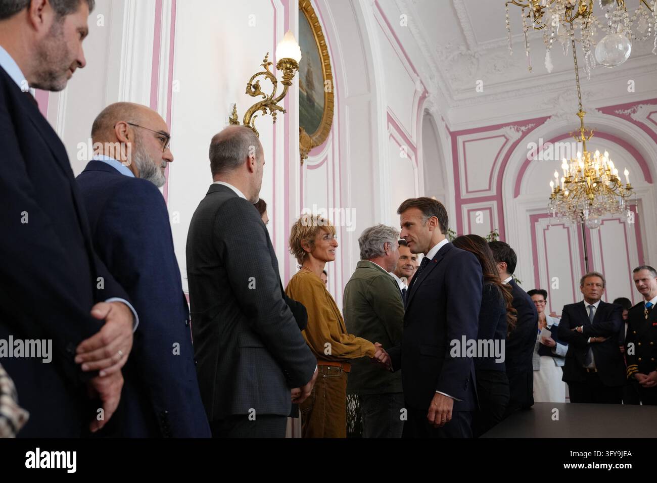 French President Emmanuel Macron meets with business owners whose ...