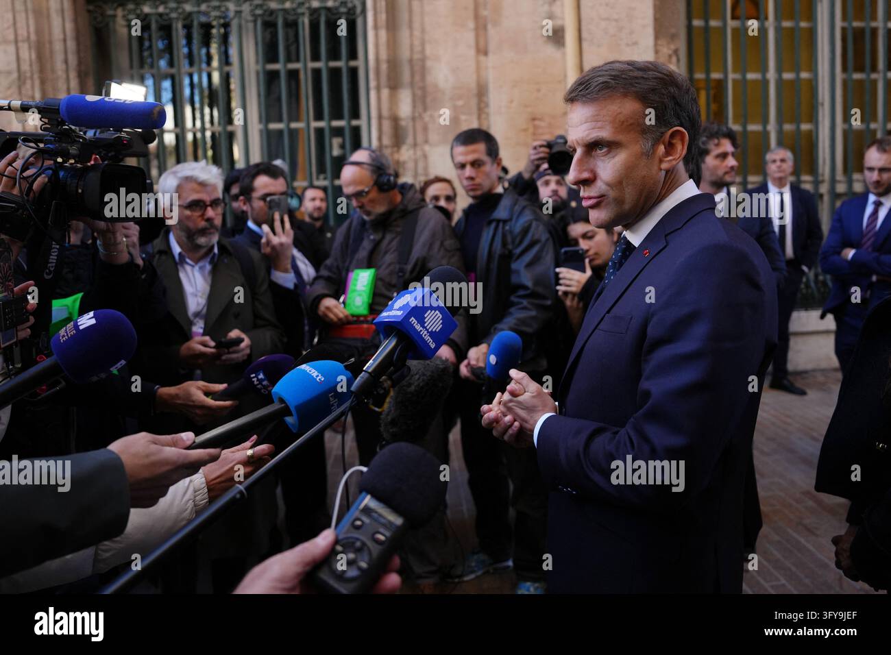 French President Emmanuel Macron addresses the media in Marseille ...
