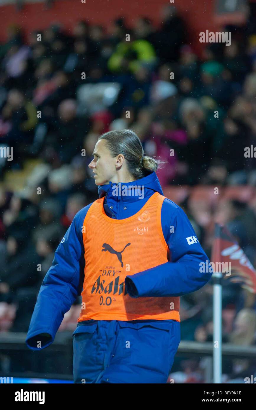 Kerstin Casparij (18 Manchester City) warms up on the touch line during ...