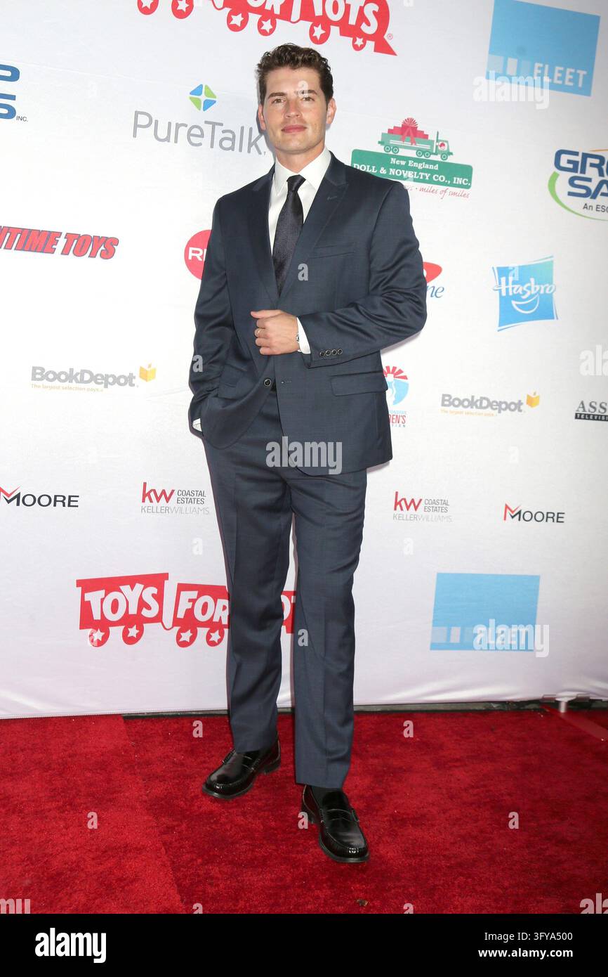 Universal Search Gregg Sulkin at arrivals for Marine Toys For Tots