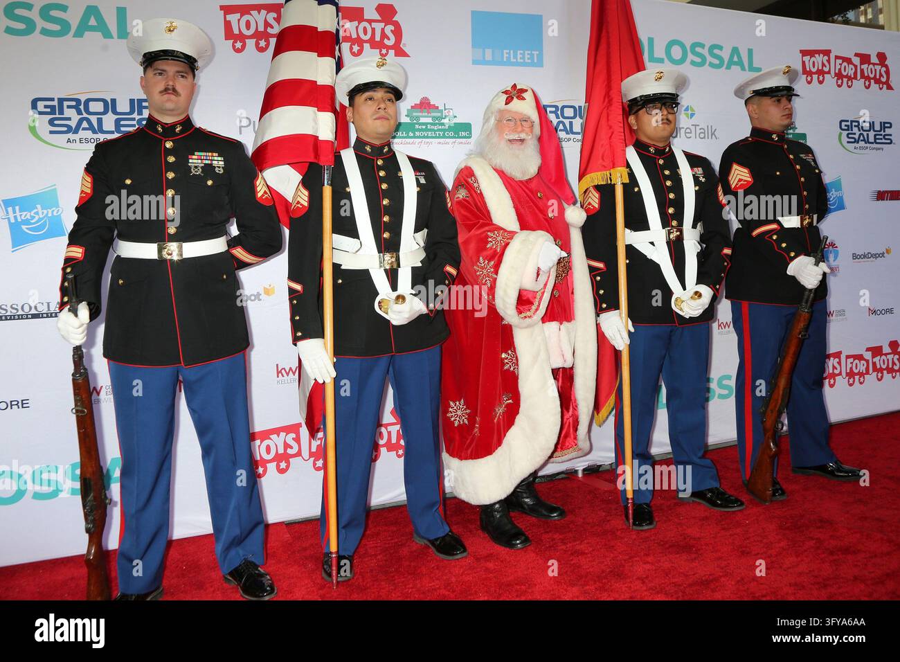 Tim Connaghan as Santa Claus, with Marine Color Guard at arrivals for ...