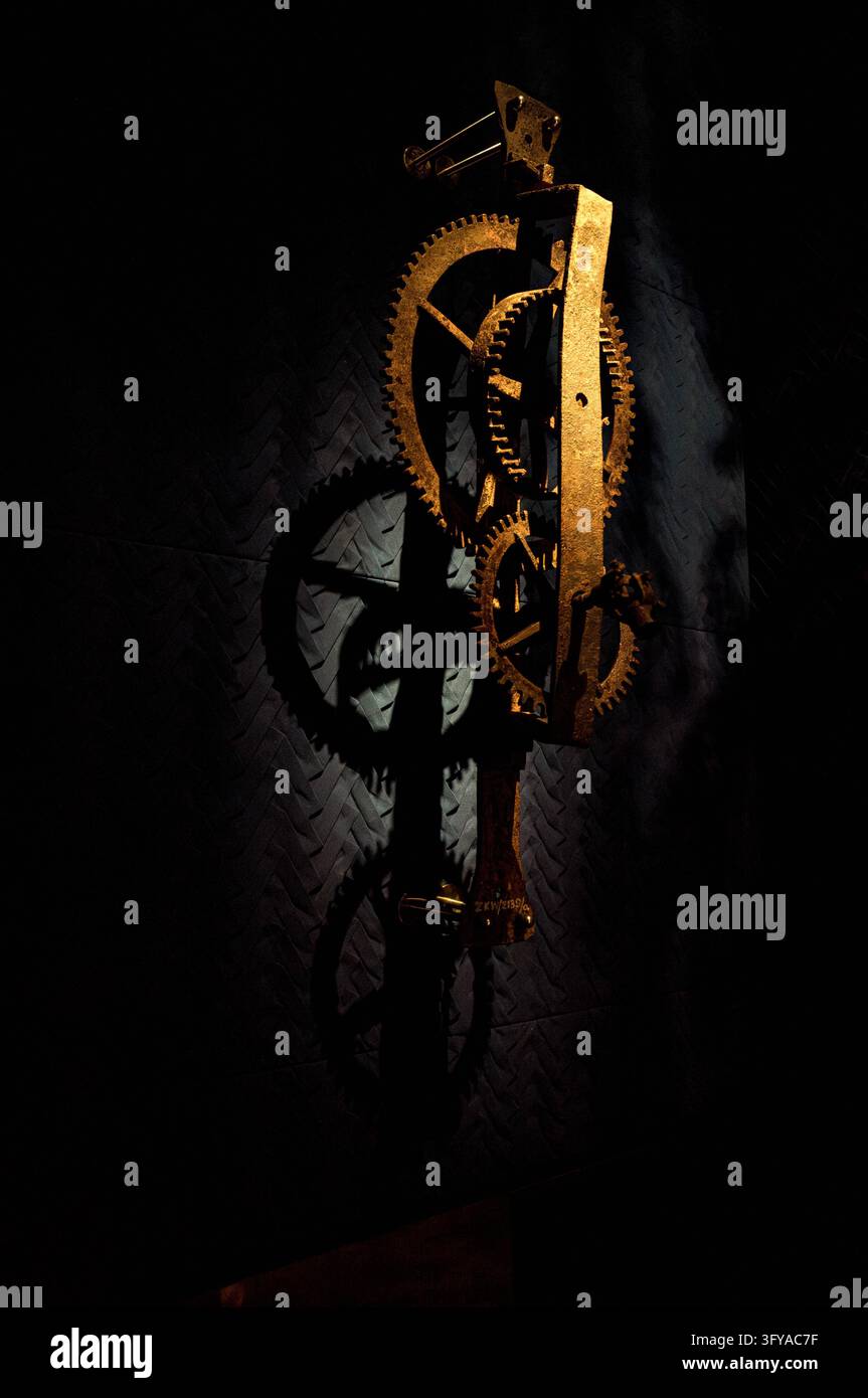 A display of clockwork gears is seen on the wall of the Clockmakers ...