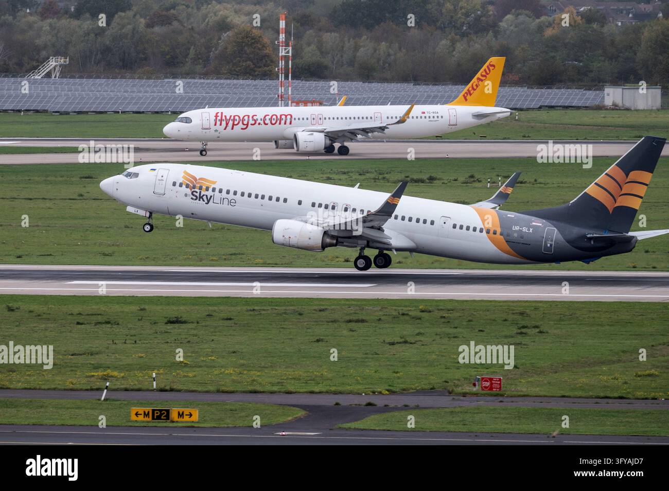 File Processing Background A Boeing 737 of Skyline Express, call sign UR-SLX, takes off from ...