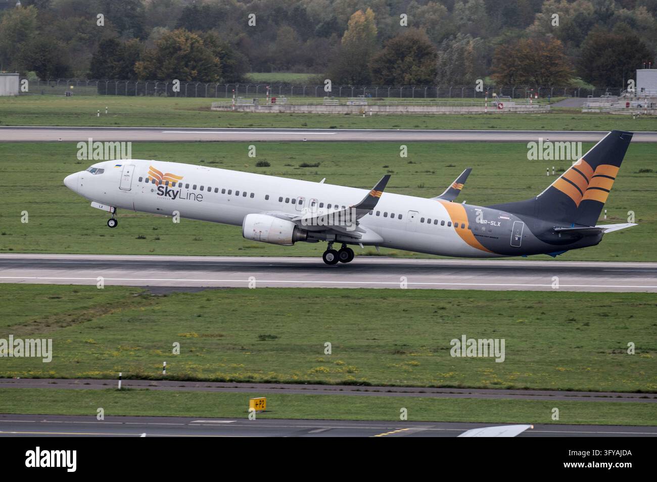 A Boeing 737 of Skyline Express, call sign UR-SLX, takes off from ...