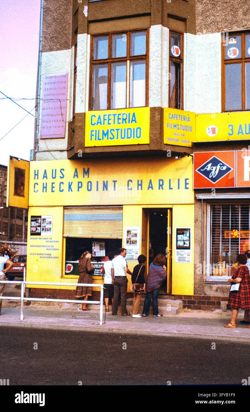 Berlin, Germany, 1980. Visitors enter the Haus am Checkpoint Charlie ...