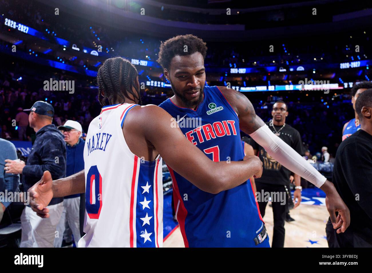 Team Hug Vector Detroit Pistons' Paul Reed, right, gives Philadelphia 76ers' Tyrese ...