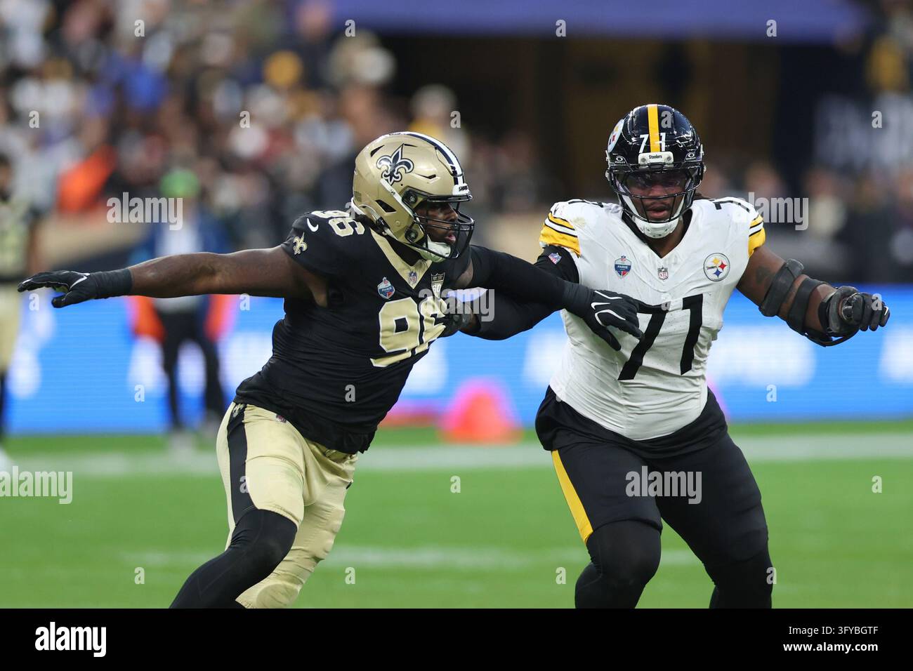 Carl Henry New Orleans Saints Carl Granderson (96) rushes past Pittsburgh Steelers ...