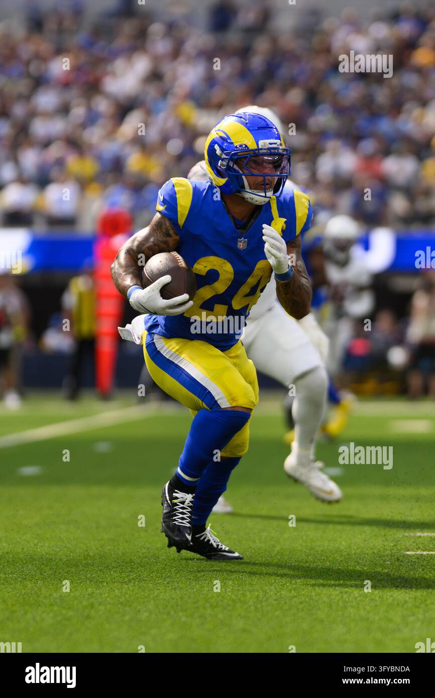 Los Angeles Rams running back Blake Corum (24) runs with the ball ...
