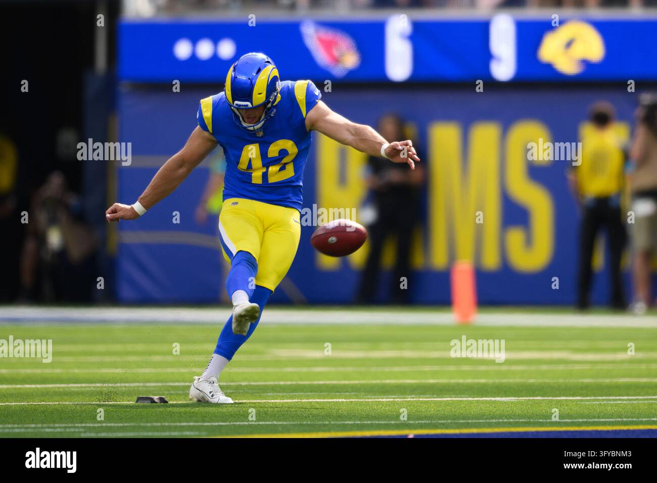 Los Angeles Rams punter Ethan Evans (42) kicks during an NFL football ...
