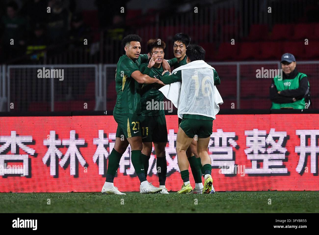 Wang Yudong, Cardoso and Tong Lei celebrate a goal during the Chinese ...