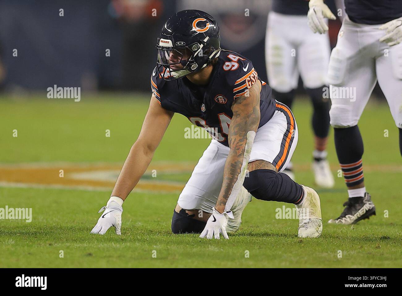 Chicago Bears defensive lineman Austin Booker (94) waits for the play ...