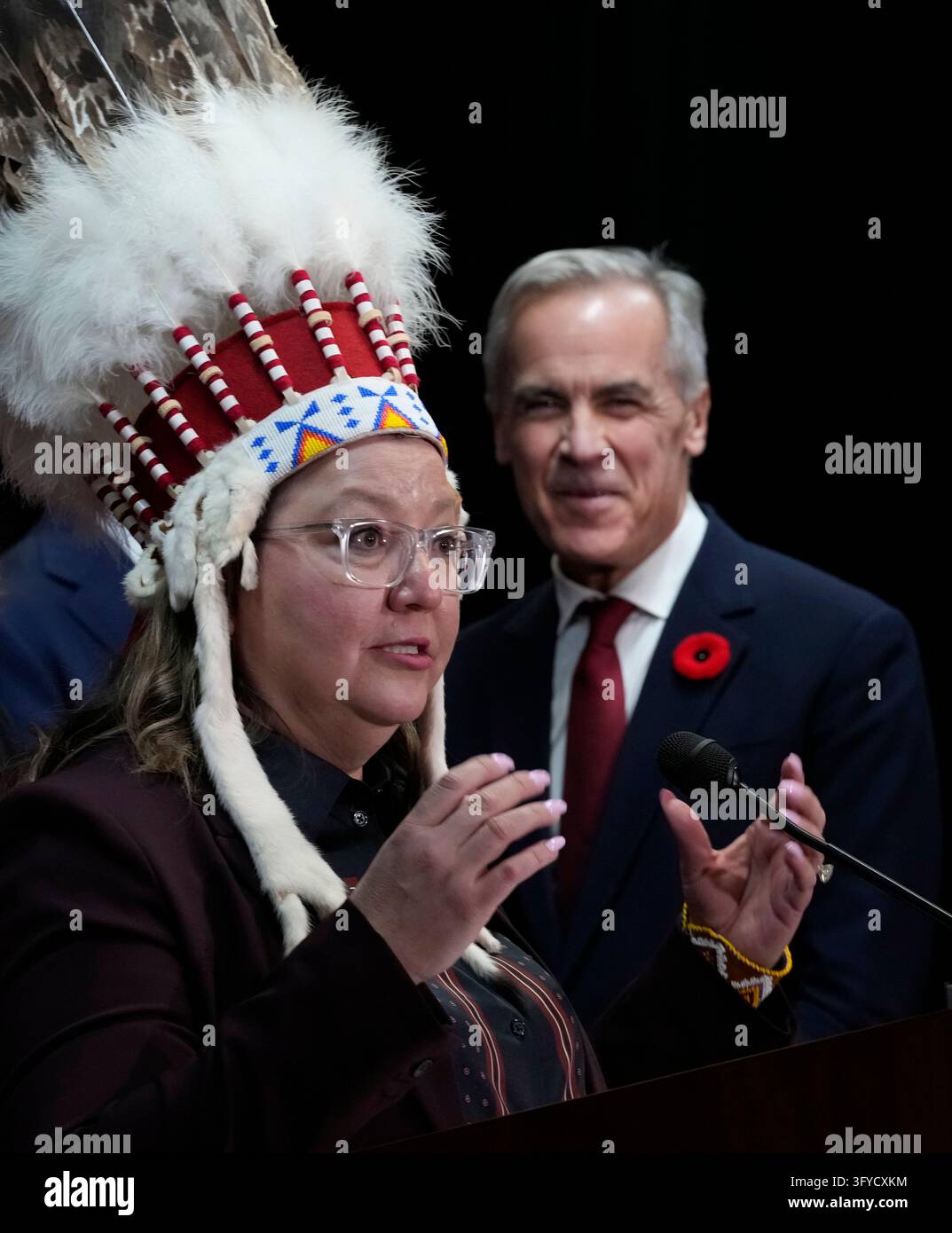 Prime Minister Mark Carney looks on as AFN National Chief Cindy ...