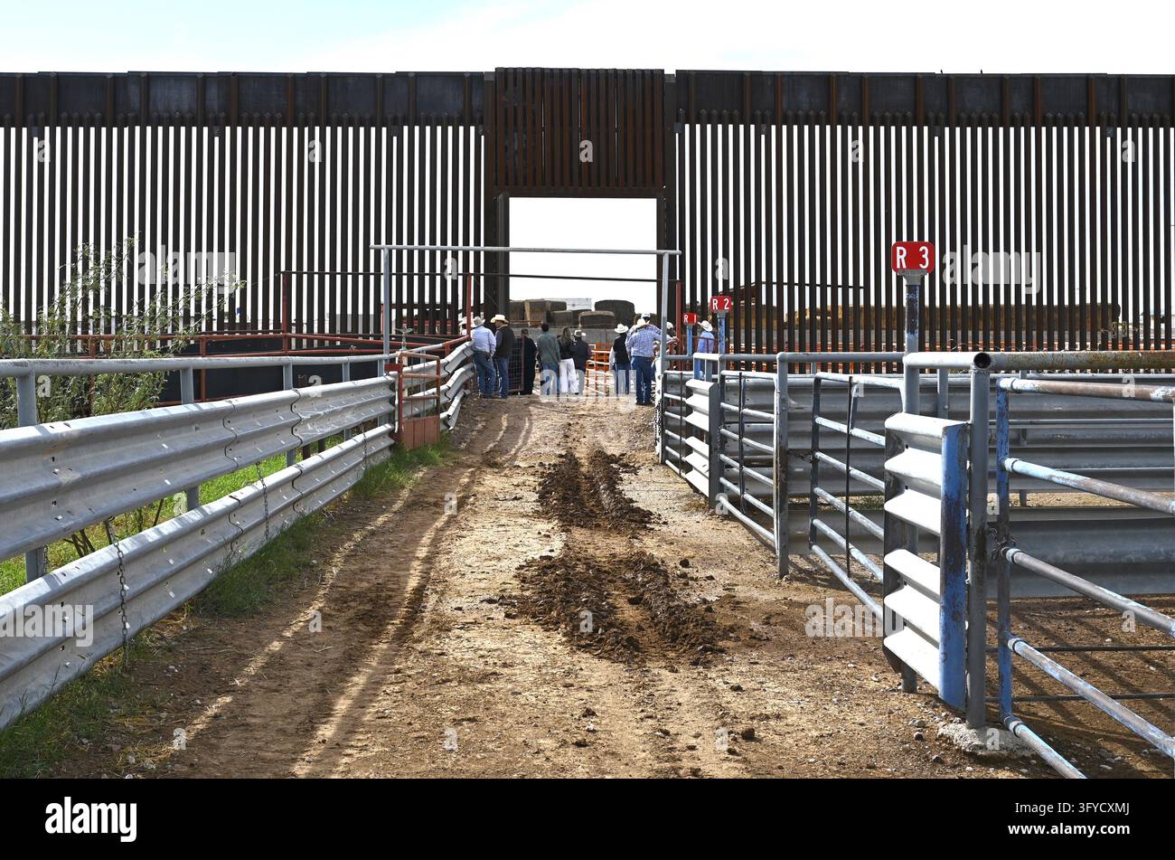 A gate in the U.S.-Mexico border wall is open for the resumption of ...