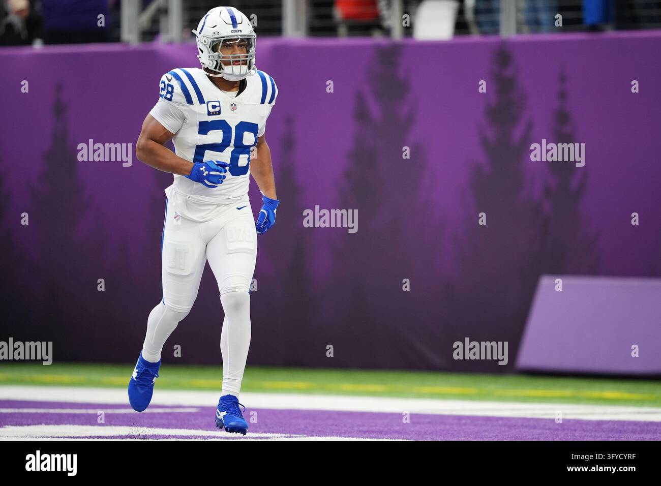 Indianapolis Colts running back Jonathan Taylor runs on the field ...