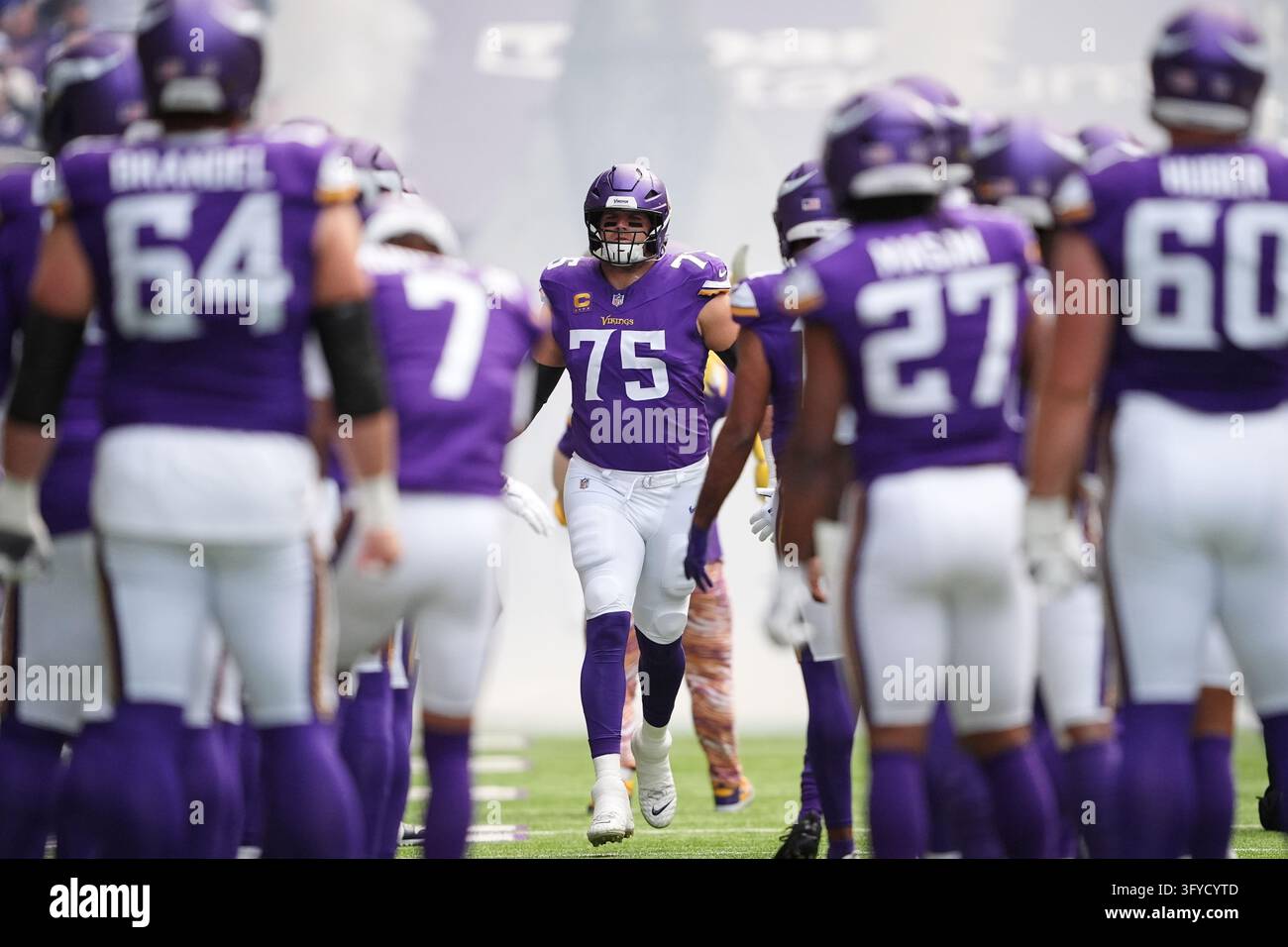 Minnesota Vikings offensive tackle Brian O'Neill (75) runs on the field ...