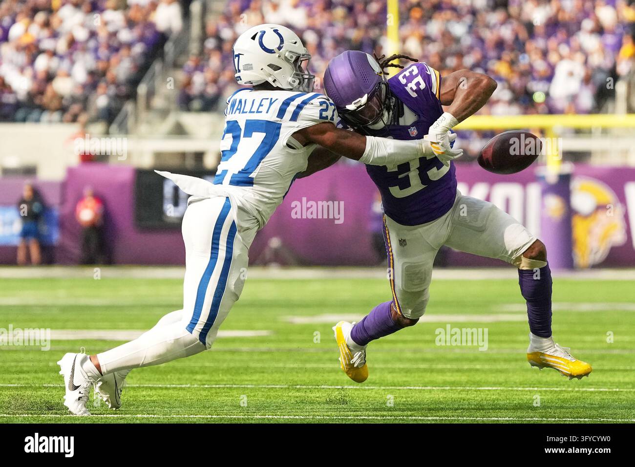 Indianapolis Colts cornerback Justin Walley (27) punches the ball away ...