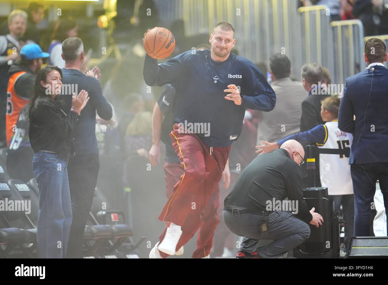 Denver Nuggets center Nikola Jokić (15) takes the court in the first ...