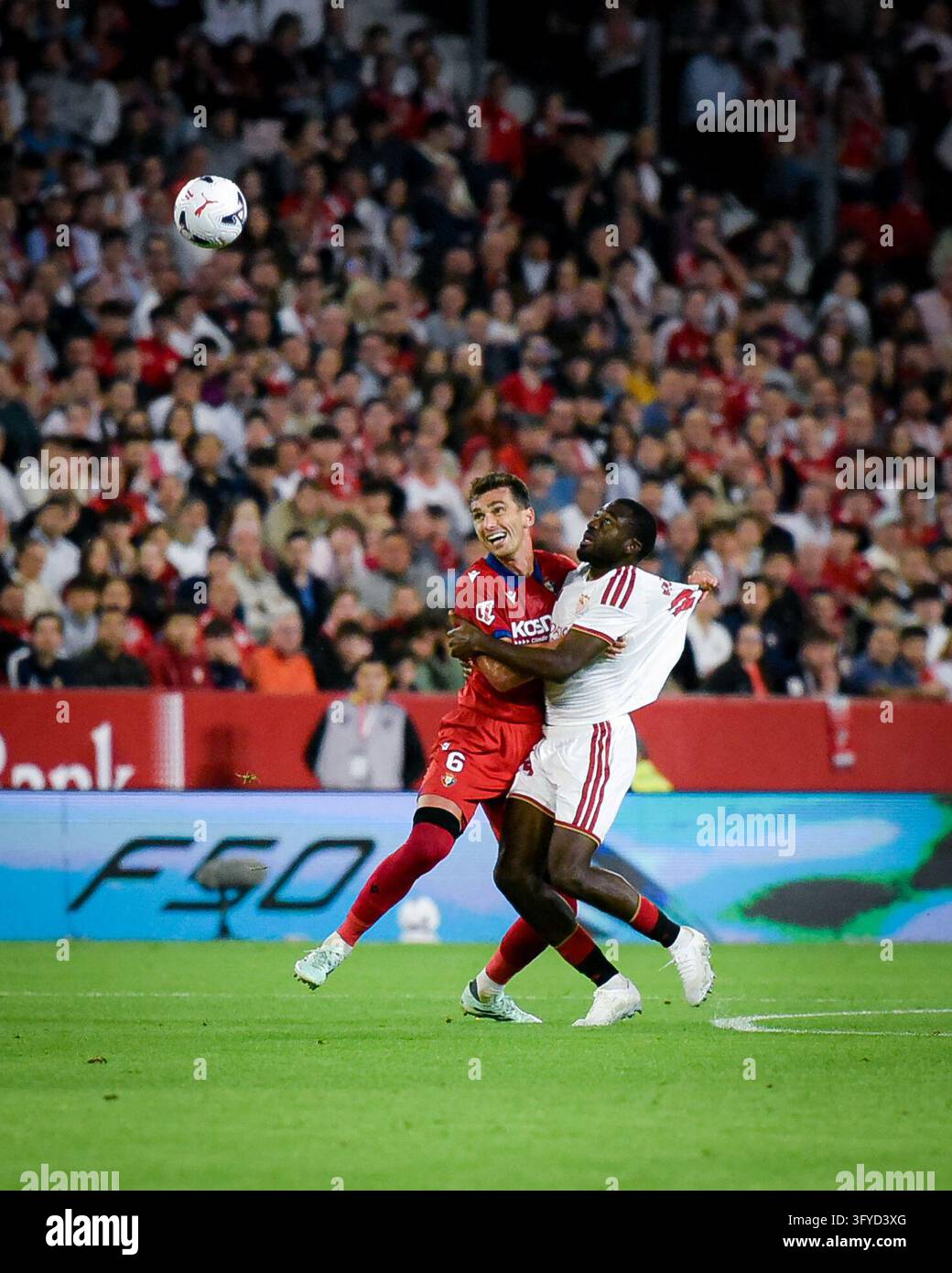 Felix Modle Lucas Torro of Osasuna and Felix Correia of Sevilla during LaLiga EA ...