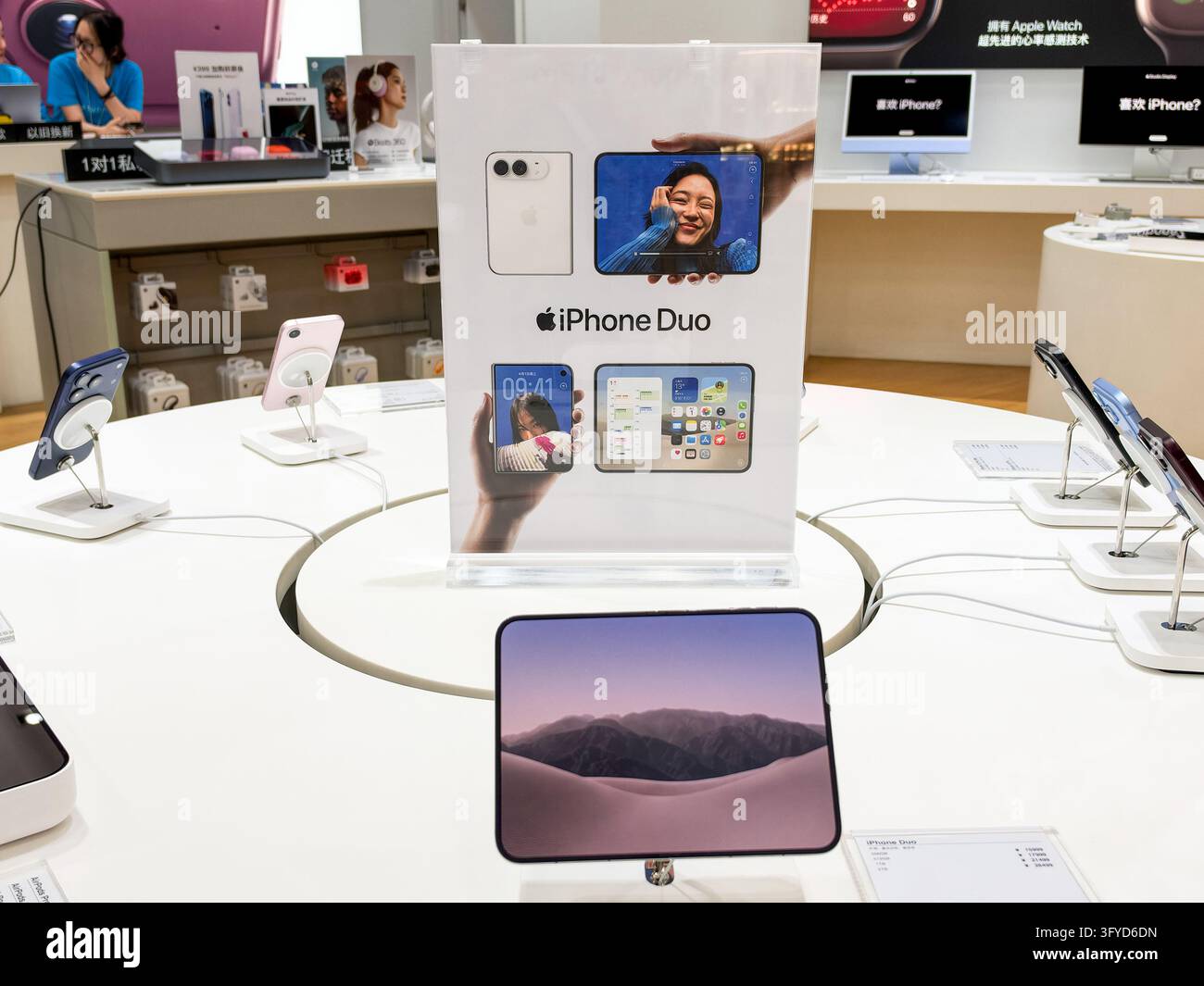 YANGZHOU, CHINA - OCTOBER 26, 2026 - A citizen experiences Apple's ...