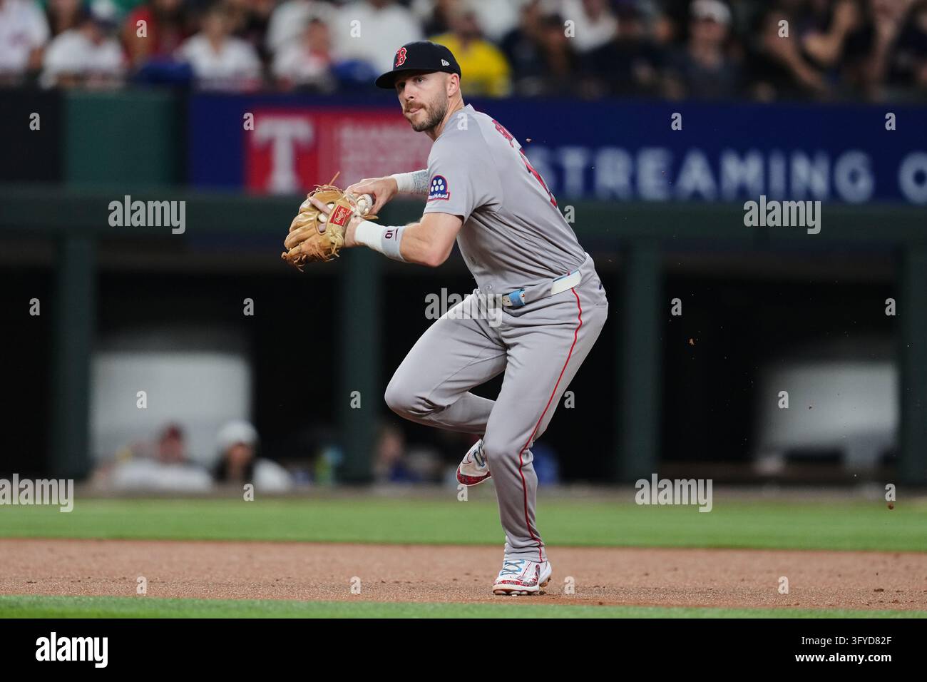 Boston Red Sox shortstop Trevor Story throws to first during a baseball ...