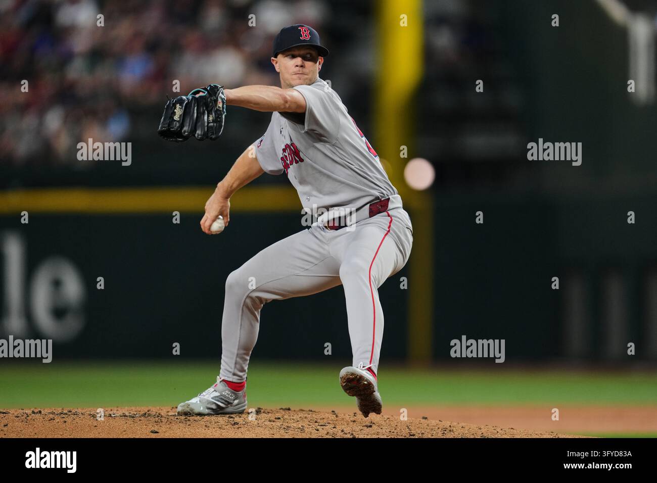 Boston Red Sox pitcher Sonny Gray winds up to deliver to the Texas ...