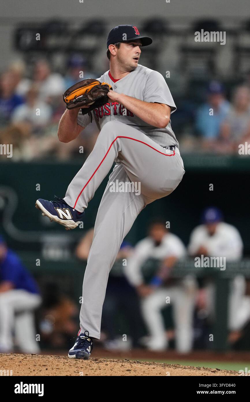 Boston Red Sox pitcher Garrett Whitlock winds up to deliver to the ...