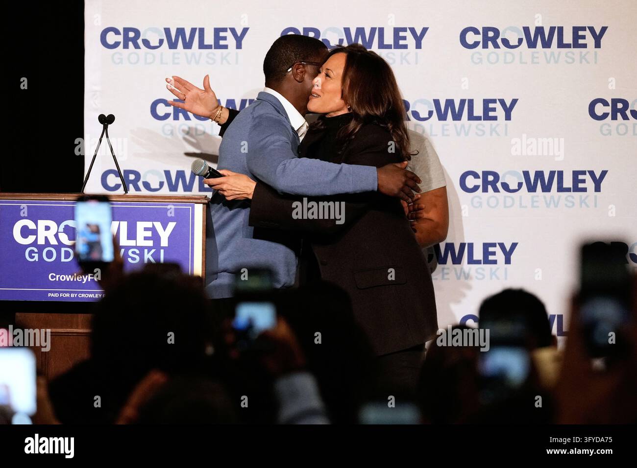 Team Hug Vector Wisconsin Democratic gubernatorial candidate David Crowley, left, gets ...