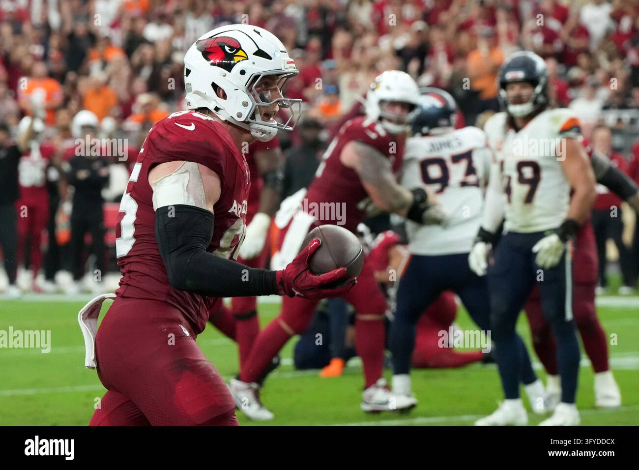 Arizona Cardinals tight end Trey McBride (85) scores a touchdown ...