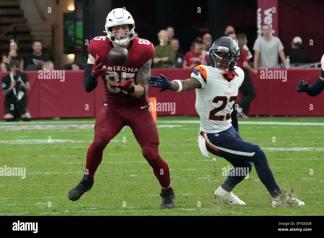 Arizona Cardinals tight end Trey McBride (85) catches the ball against ...