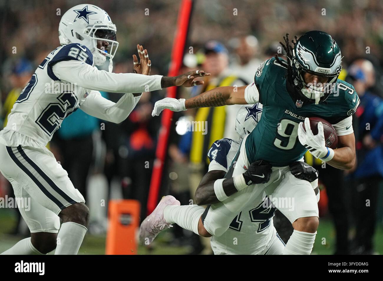Lemon Phot Philadelphia Eagles wide receiver Makai Lemon (9) is brought down by ...