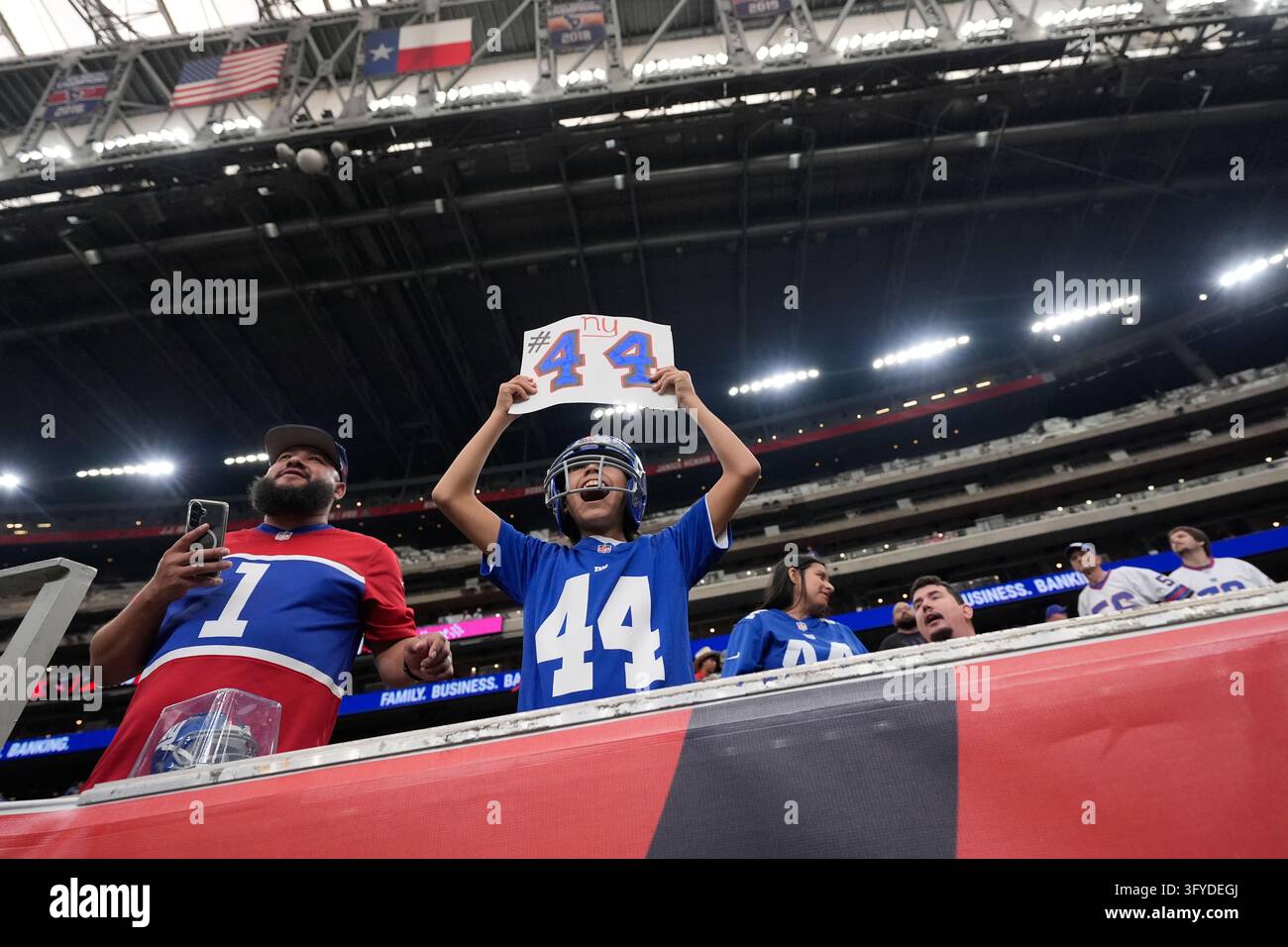 Video Fan C A New York Giants fan watches warmups before an NFL football game ...