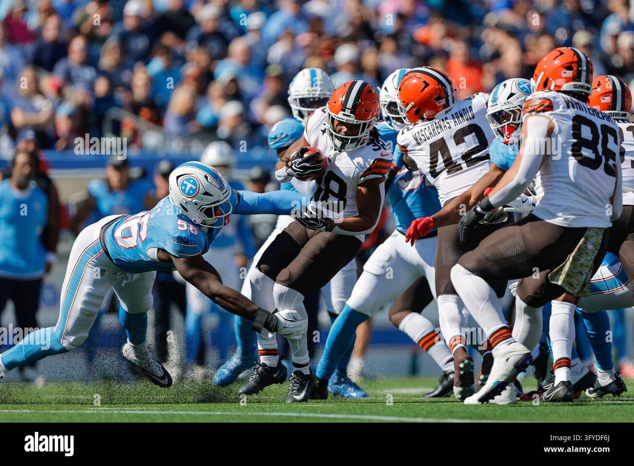 Cleveland Browns running back Jaleel McLaughlin (38) is tackled by ...