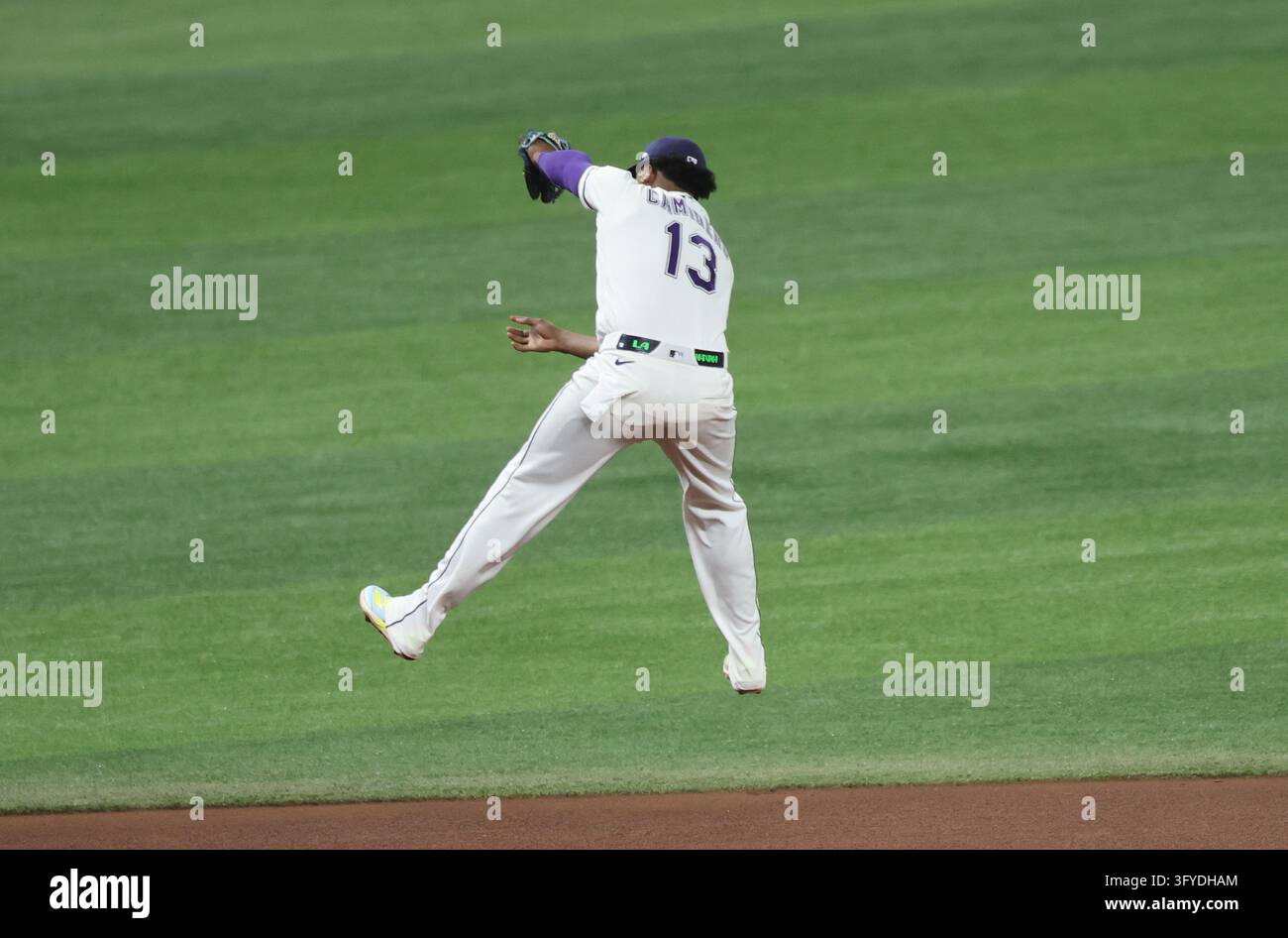 Tampa Bay Rays third baseman Junior Caminero (13 leaps to catch a hard ...