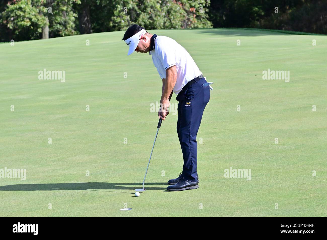ST. LOUIS, MO - OCTOBER 25: Golfer YE Yang of South Korea putts on the ...
