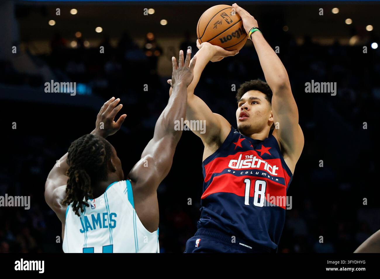 Washington Wizards forward Kyshawn George (18) looks to shoot over ...