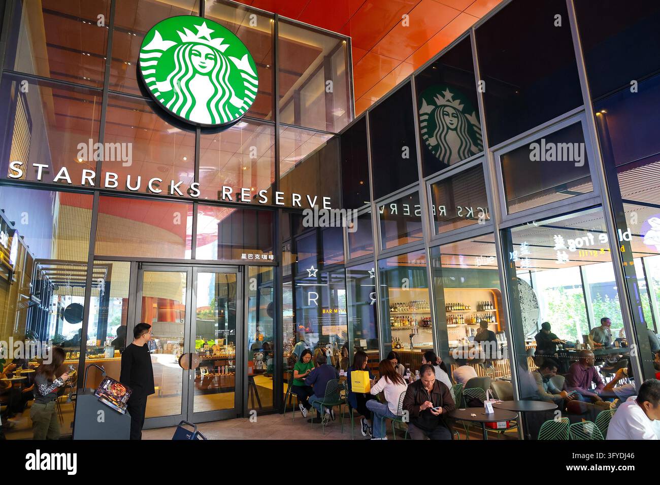Starbucks stores in Shanghai have set up signs reading 