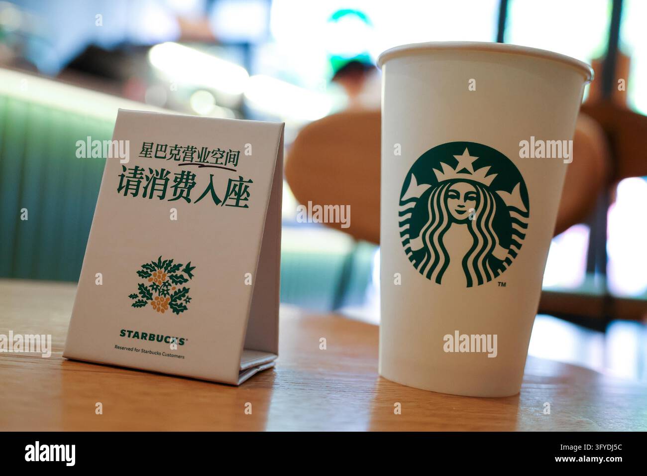 Starbucks stores in Shanghai have set up signs reading 