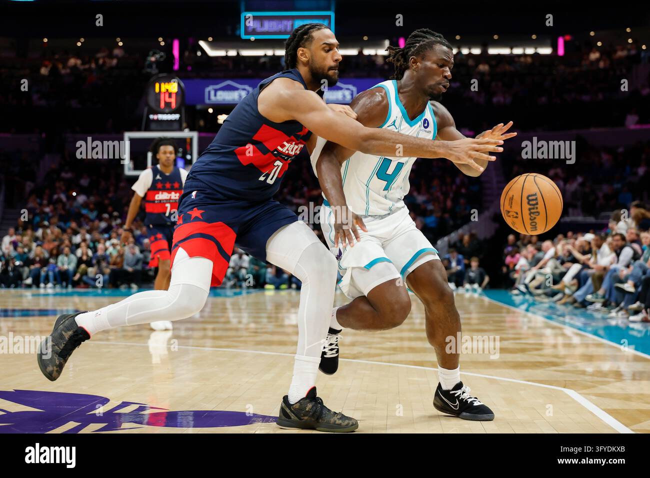 Charlotte Hornets guard Sion James (4) battles Washington Wizards ...