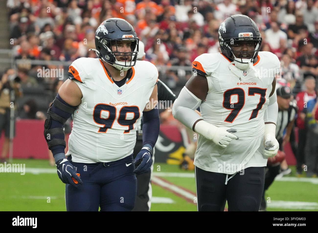Denver Broncos defensive end Zach Allen (99) and defensive tackle ...