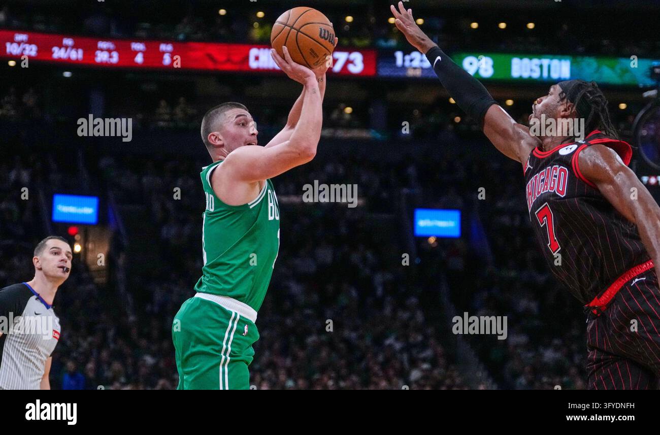 Boston Celtics' Payton Pritchard, second from left, prepares to take a ...