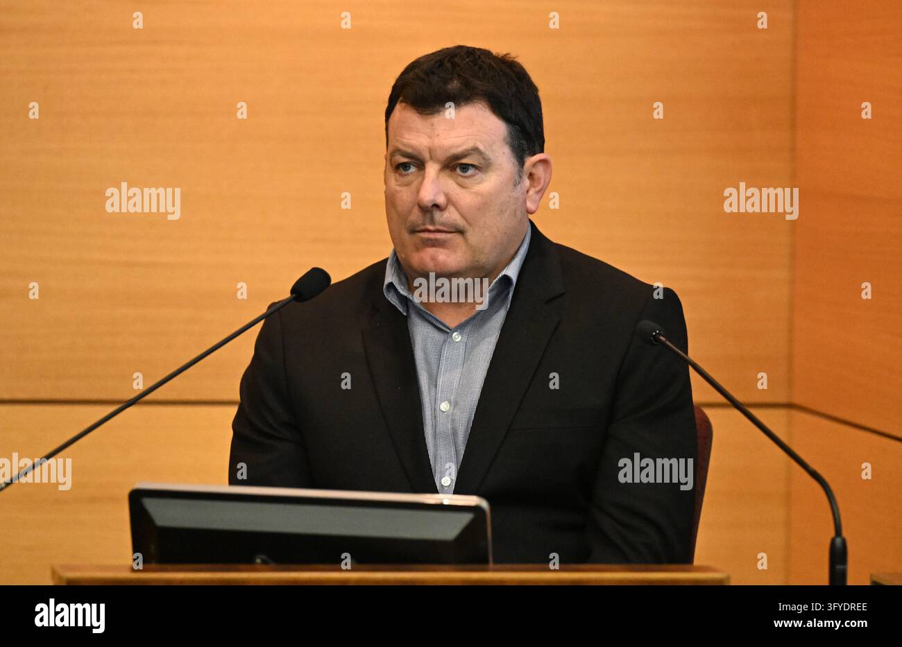 Locating Evidence Joe Barker is seen giving evidence during public hearings into the ...