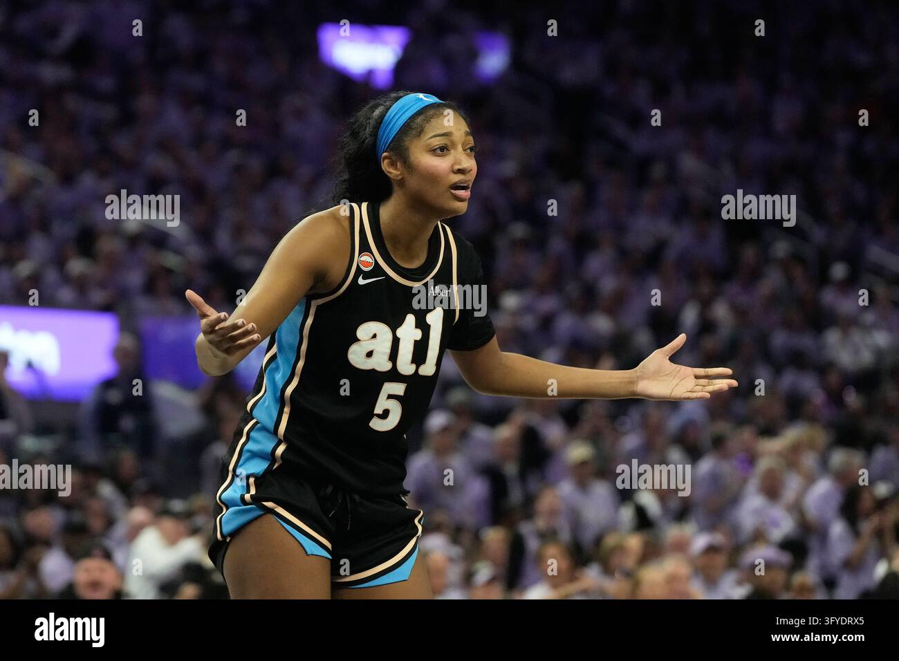 Atlanta Dream forward Angel Reese (5) reacts after being called for a ...