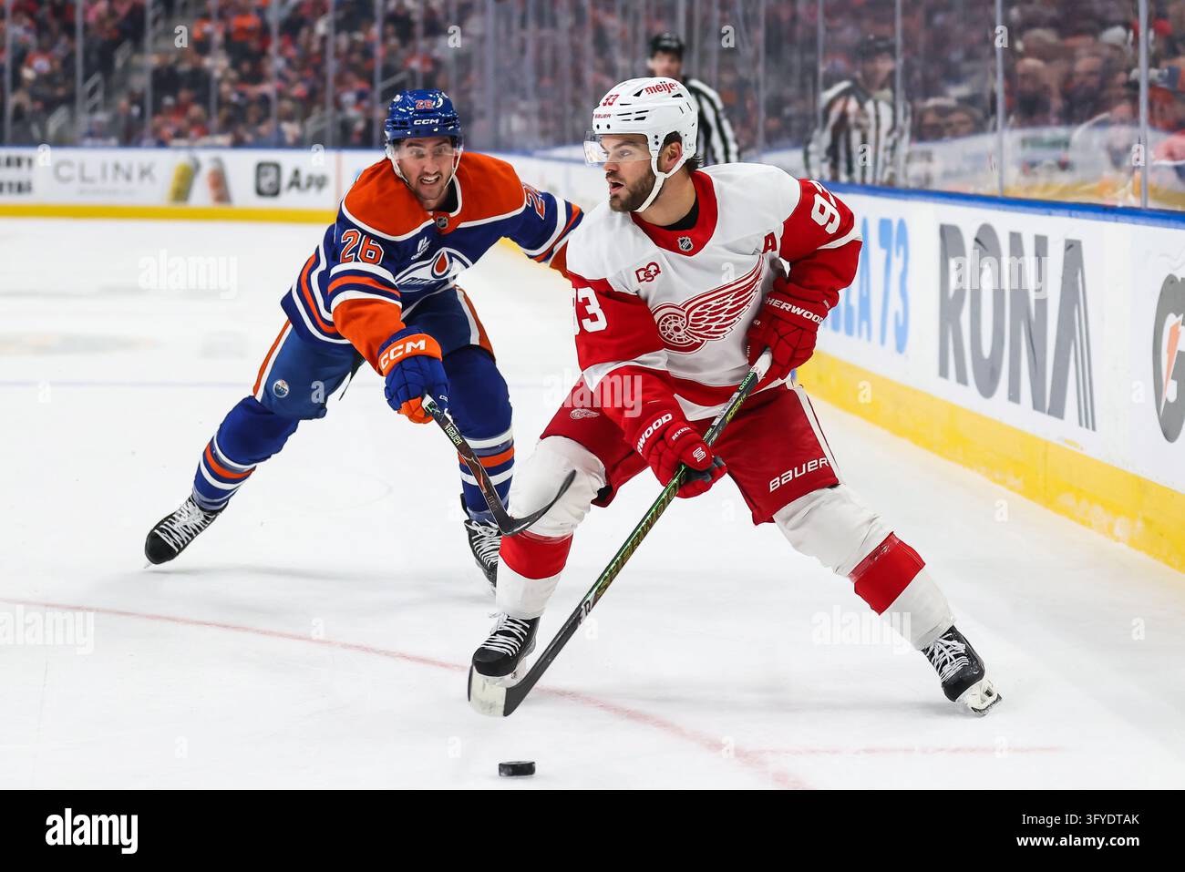 Edmonton Oilers' Alex Formenton (26) pursues Detroit Red Wings' Alex ...